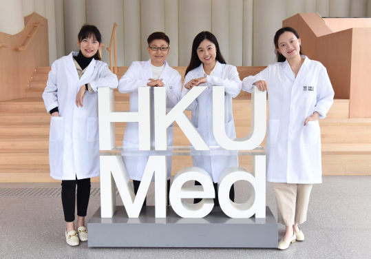 HKUMed discovers a novel mediator of liver fibrosis and its underlying mechanism that can be a new therapeutic target. The research was led by Dr Ruby Hoo Lai-chong (second from left), Assistant Professor, Department of Pharmacology and Pharmacy, HKUMed and Co-investigator of State Key Laboratory of Pharmaceutical Biotechnology, HKU. Dr Wu Xiaoping (second from right), post-doctoral fellow, Department of Pharmacology and Pharmacy, HKUMed is the first author. Other research team members include: Ms Zong Jiuyu (left) and Ms Zhang Zixuan (right), postgraduate student, Department of Pharmacology and Pharmacy, HKUMed.
 